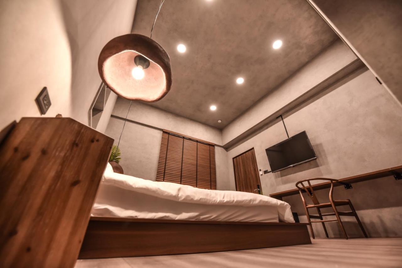 Eryang Homestay تاينان المظهر الخارجي الصورة